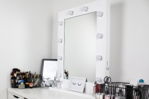 Hayley's beautiful vanity setup, including one of our very own Hollywood mirrors. 